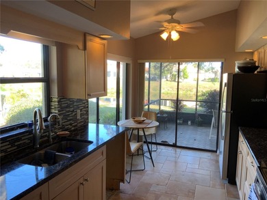 This beautifully renovated two bedroom, two bathroom villa with on Plantation Golf and Country Club in Florida - for sale on GolfHomes.com, golf home, golf lot