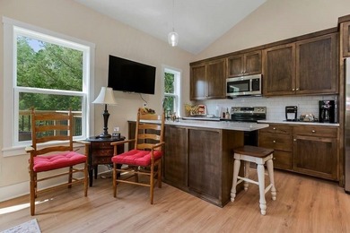 Perfect 2 bedroom, 2 bathroom cabin at Linn Valley Lakes on Linn Valley Lakes - Deer Trace Golf Course in Kansas - for sale on GolfHomes.com, golf home, golf lot