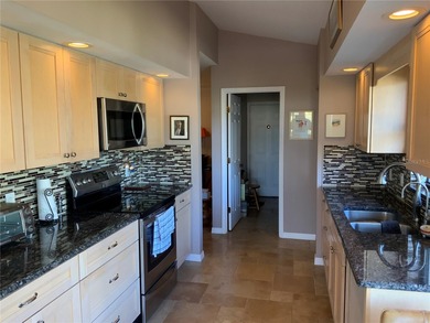 This beautifully renovated two bedroom, two bathroom villa with on Plantation Golf and Country Club in Florida - for sale on GolfHomes.com, golf home, golf lot