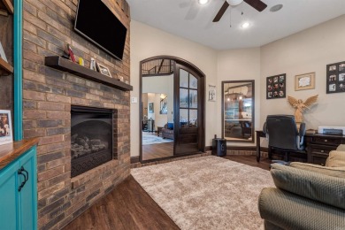 Stunning updated executive home with sunroom and screened porch on Sage Meadows Golf Course in Arkansas - for sale on GolfHomes.com, golf home, golf lot