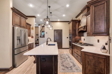 Stunning updated executive home with sunroom and screened porch on Sage Meadows Golf Course in Arkansas - for sale on GolfHomes.com, golf home, golf lot