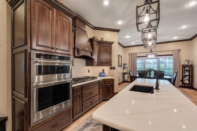 Stunning updated executive home with sunroom and screened porch on Sage Meadows Golf Course in Arkansas - for sale on GolfHomes.com, golf home, golf lot