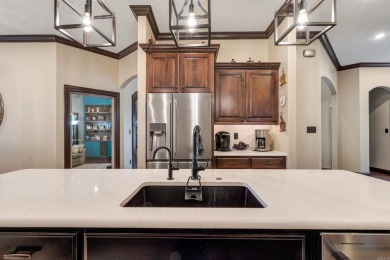 Stunning updated executive home with sunroom and screened porch on Sage Meadows Golf Course in Arkansas - for sale on GolfHomes.com, golf home, golf lot