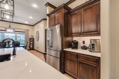 Stunning updated executive home with sunroom and screened porch on Sage Meadows Golf Course in Arkansas - for sale on GolfHomes.com, golf home, golf lot