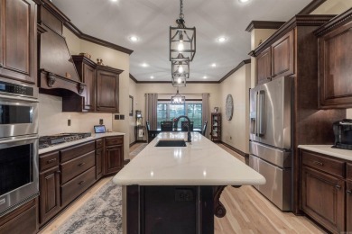 Stunning updated executive home with sunroom and screened porch on Sage Meadows Golf Course in Arkansas - for sale on GolfHomes.com, golf home, golf lot