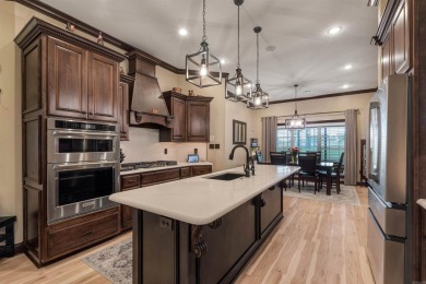 Stunning updated executive home with sunroom and screened porch on Sage Meadows Golf Course in Arkansas - for sale on GolfHomes.com, golf home, golf lot