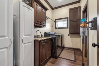 Stunning updated executive home with sunroom and screened porch on Sage Meadows Golf Course in Arkansas - for sale on GolfHomes.com, golf home, golf lot