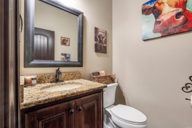 Stunning updated executive home with sunroom and screened porch on Sage Meadows Golf Course in Arkansas - for sale on GolfHomes.com, golf home, golf lot