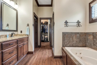 Stunning updated executive home with sunroom and screened porch on Sage Meadows Golf Course in Arkansas - for sale on GolfHomes.com, golf home, golf lot