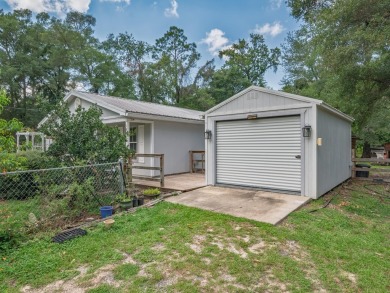 Built in 2014, this move-in ready, well-maintained home features on Wildwood Country Club in Florida - for sale on GolfHomes.com, golf home, golf lot