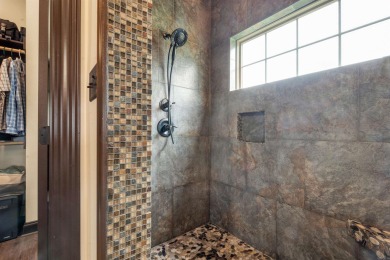 Stunning updated executive home with sunroom and screened porch on Sage Meadows Golf Course in Arkansas - for sale on GolfHomes.com, golf home, golf lot