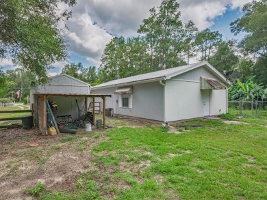 Built in 2014, this move-in ready, well-maintained home features on Wildwood Country Club in Florida - for sale on GolfHomes.com, golf home, golf lot