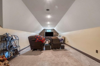 Stunning updated executive home with sunroom and screened porch on Sage Meadows Golf Course in Arkansas - for sale on GolfHomes.com, golf home, golf lot