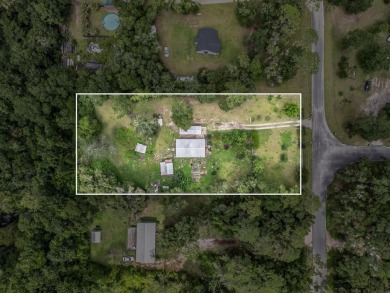 Built in 2014, this move-in ready, well-maintained home features on Wildwood Country Club in Florida - for sale on GolfHomes.com, golf home, golf lot