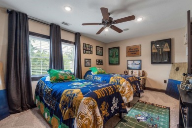 Stunning updated executive home with sunroom and screened porch on Sage Meadows Golf Course in Arkansas - for sale on GolfHomes.com, golf home, golf lot