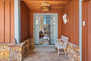 Discover this four-bedroom, five-bath residence positioned on a on Aspen Glen Club in Colorado - for sale on GolfHomes.com, golf home, golf lot