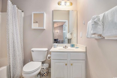 This spacious 2-bedroom, 2-bath, top-floor condo features on Barefoot Resort and Golf Club  in South Carolina - for sale on GolfHomes.com, golf home, golf lot