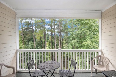 This spacious 2-bedroom, 2-bath, top-floor condo features on Barefoot Resort and Golf Club  in South Carolina - for sale on GolfHomes.com, golf home, golf lot