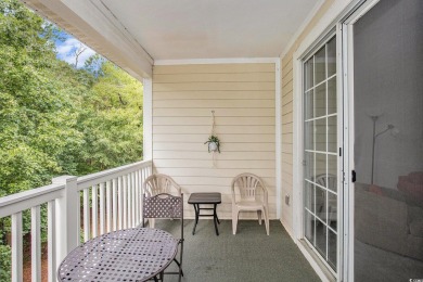 This spacious 2-bedroom, 2-bath, top-floor condo features on Barefoot Resort and Golf Club  in South Carolina - for sale on GolfHomes.com, golf home, golf lot