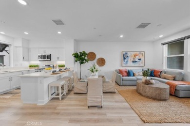 Experience modern luxury in this pristine Anaheim townhome on Dad Miller Golf Course in California - for sale on GolfHomes.com, golf home, golf lot