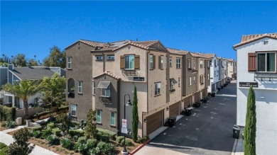 Experience modern luxury in this pristine Anaheim townhome on Dad Miller Golf Course in California - for sale on GolfHomes.com, golf home, golf lot