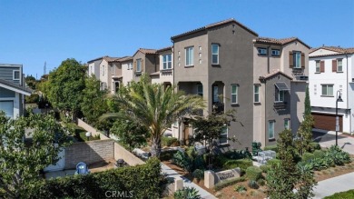 Experience modern luxury in this pristine Anaheim townhome on Dad Miller Golf Course in California - for sale on GolfHomes.com, golf home, golf lot