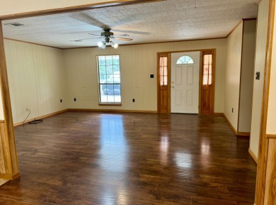 This charming brick home is nestled on 1 acre in a peaceful area on Cypress Bend Golf Resort in Louisiana - for sale on GolfHomes.com, golf home, golf lot