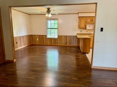 This charming brick home is nestled on 1 acre in a peaceful area on Cypress Bend Golf Resort in Louisiana - for sale on GolfHomes.com, golf home, golf lot