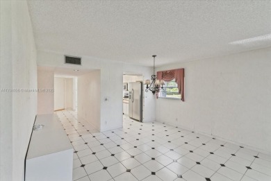 Beautiful views of golf course, this 2 bedroom/2 bath unit has on Flamingo Lakes Country Club in Florida - for sale on GolfHomes.com, golf home, golf lot