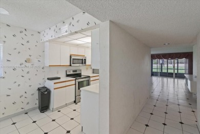 Beautiful views of golf course, this 2 bedroom/2 bath unit has on Flamingo Lakes Country Club in Florida - for sale on GolfHomes.com, golf home, golf lot