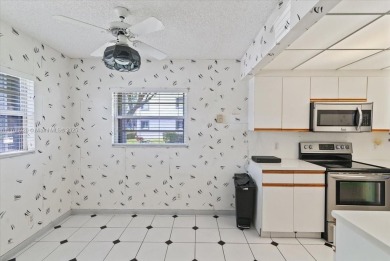 Beautiful views of golf course, this 2 bedroom/2 bath unit has on Flamingo Lakes Country Club in Florida - for sale on GolfHomes.com, golf home, golf lot