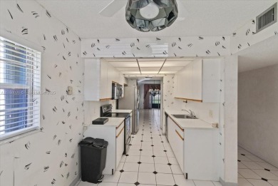 Beautiful views of golf course, this 2 bedroom/2 bath unit has on Flamingo Lakes Country Club in Florida - for sale on GolfHomes.com, golf home, golf lot