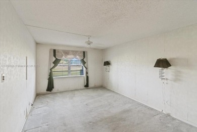 Beautiful views of golf course, this 2 bedroom/2 bath unit has on Flamingo Lakes Country Club in Florida - for sale on GolfHomes.com, golf home, golf lot