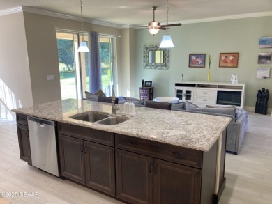 This is an amazing home on the golf course with all the privacy on Halifax Plantation Golf Club in Florida - for sale on GolfHomes.com, golf home, golf lot
