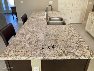 This is an amazing home on the golf course with all the privacy on Halifax Plantation Golf Club in Florida - for sale on GolfHomes.com, golf home, golf lot