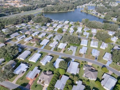 Move In Ready!  Make this your seasonal retreat, permanent home on Silver Lake Executive Golf Course in Florida - for sale on GolfHomes.com, golf home, golf lot