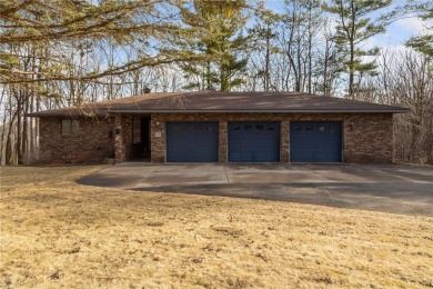 This custom-built, 5 BD/3 BA brick rambler is a rare find on Spring Valley Golf Course in Wisconsin - for sale on GolfHomes.com, golf home, golf lot