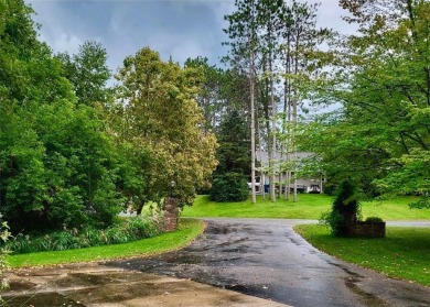 This custom-built, 5 BD/3 BA brick rambler is a rare find on Spring Valley Golf Course in Wisconsin - for sale on GolfHomes.com, golf home, golf lot