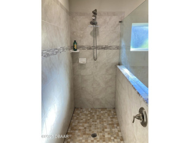 This is an amazing home on the golf course with all the privacy on Halifax Plantation Golf Club in Florida - for sale on GolfHomes.com, golf home, golf lot