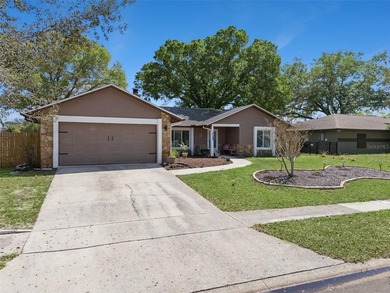 Beautiful 3-bedroom, 2-bath home in the heart of Casselberry on Casselberry Golf Club in Florida - for sale on GolfHomes.com, golf home, golf lot