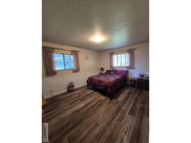 Great home bordering Fremont County Golf course. This home is on on Fremont County Golf Course in Idaho - for sale on GolfHomes.com, golf home, golf lot