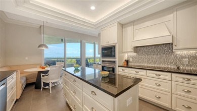 One or more photo(s) has been virtually staged. Sweeping Gulf on Links on Longboat Golf Club in Florida - for sale on GolfHomes.com, golf home, golf lot
