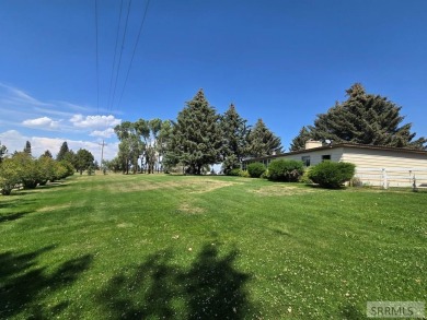 Great home bordering Fremont County Golf course. This home is on on Fremont County Golf Course in Idaho - for sale on GolfHomes.com, golf home, golf lot