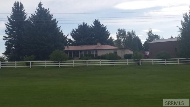Great home bordering Fremont County Golf course. This home is on on Fremont County Golf Course in Idaho - for sale on GolfHomes.com, golf home, golf lot
