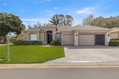 Welcome to this stunning Hampton floor plan home, located in the on Eagle Ridge At Spruce Creek Country Club in Florida - for sale on GolfHomes.com, golf home, golf lot