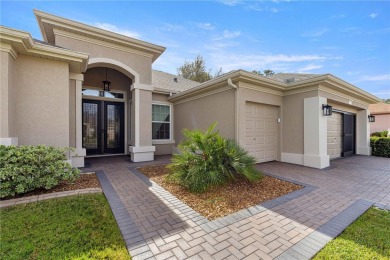 Welcome to this stunning Hampton floor plan home, located in the on Eagle Ridge At Spruce Creek Country Club in Florida - for sale on GolfHomes.com, golf home, golf lot