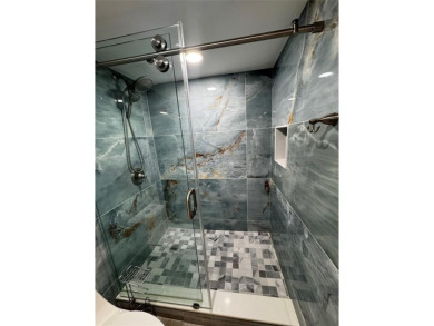Step into luxury with this beautifully 2/2 condo located in the on Palm-Aire Country Club and Resort - Palms in Florida - for sale on GolfHomes.com, golf home, golf lot