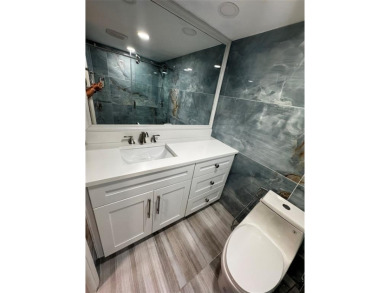 Step into luxury with this beautifully 2/2 condo located in the on Palm-Aire Country Club and Resort - Palms in Florida - for sale on GolfHomes.com, golf home, golf lot