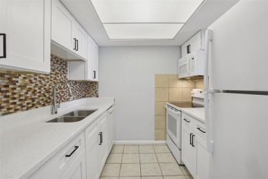 Discover the charm of this beautifully renovated 1 Bedroom, 1 on Clearwater Executive Golf Course in Florida - for sale on GolfHomes.com, golf home, golf lot