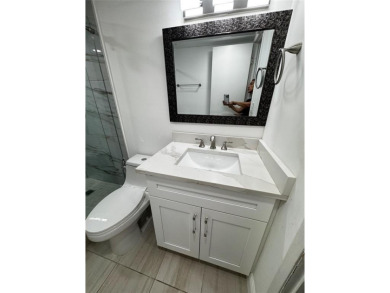 Step into luxury with this beautifully 2/2 condo located in the on Palm-Aire Country Club and Resort - Palms in Florida - for sale on GolfHomes.com, golf home, golf lot